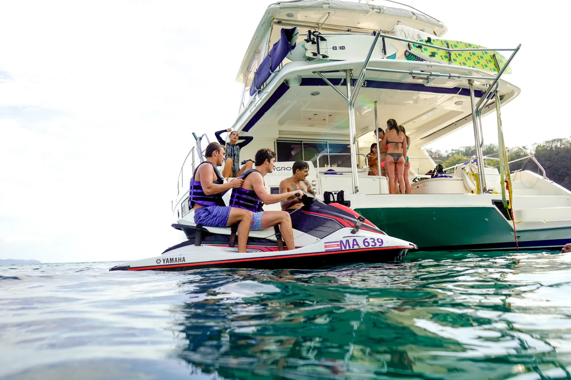 A boat on the water off the Guanacaste coast with people aboard